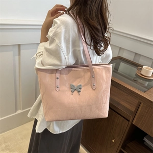 Pink pleated tote bag with silver butterfly charm, stylish minimalist shoulder bag for women
