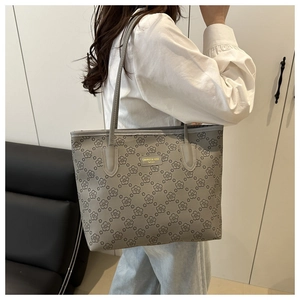 Detailed view showing the elegant grey floral pattern on this large capacity fashion tote bag.