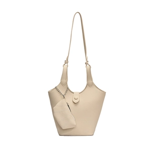 Minimalist beige pebble leather bucket bag for women with matching small zip pouch