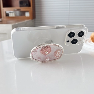 Support de téléphone camélia rose avec perles et strass sur coque scintillante