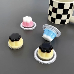 Detailed view of 3D pudding and flower resin charms with MagSafe magnetic base