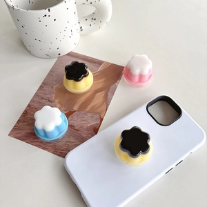 Minimalist jelly flower phone socket grip in pastel resin on a white mobile case