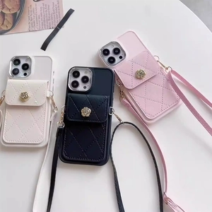 Quilted leather phone case with camellia card holder and crossbody strap for iPhone