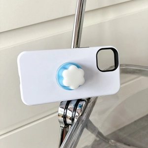 Close-up of a blue and white jelly flower phone socket on a white matte mobile case