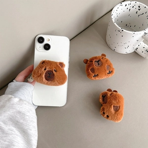 Cute plush capybara phone grip and expandable stand with soft brown faux fur and embroidery