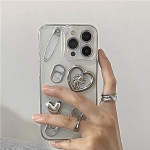 Clear iPhone case with silver 3D heart, tab ring charms and wrinkled metallic rings