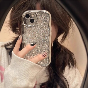 Silver wavy frame phone case with shimmering glitter for iPhone 16 Pro Max