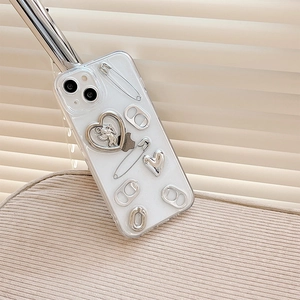 Detail of clear iPhone case with silver charms heart and cupid pull ring charms