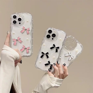 Sparkly glitter iPhone case with wave edges, 3D bow design and pearl accents