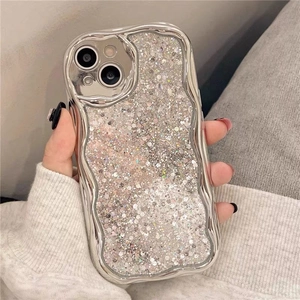 Detail of silver wavy chrome phone case with glitter sequins for iPhone 16 Pro Max