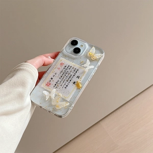 Detailed view of the clear iPhone case with gold foil, 3D butterfly and money turtle