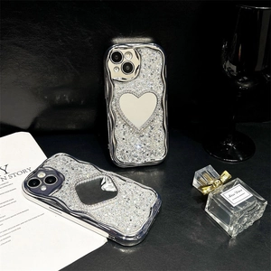 Silver wavy edge iPhone case with glitter heart and mirror on black luxury background