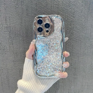 Close-up of silver glitter phone case with wavy edges and full lens protection