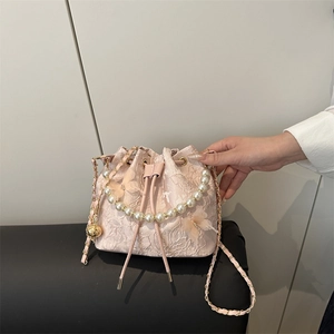 Pink lace embroidered bucket bag with pearl handle and butterfly accents for women