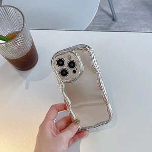 Close-up of wavy silver electroplated edges and pearlescent back of iPhone protective case