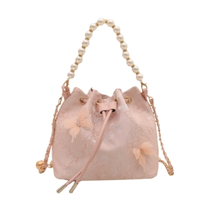 Pink butterfly bucket bag with floral embroidery, pearl handle and gold chain strap