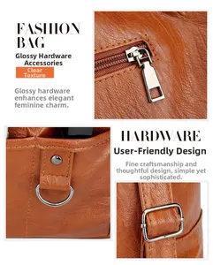 Detail of caramel leather texture and shiny silver metal hardware on women's handbag