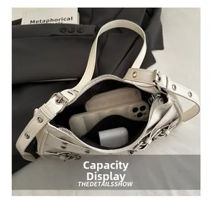 Top view of the white Y2K leather bag interior capacity with silver metal eyelets