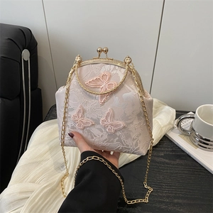 Pink vintage jacquard handbag with butterfly embroidery and golden chain strap