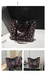 Detailed views of floral tote bag with pink flowers, white bows and black straps