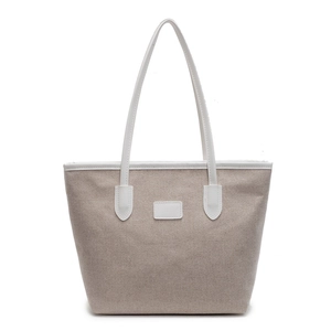 Minimalist beige canvas tote bag with white leather straps and large capacity for women