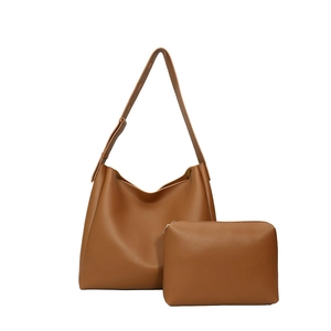 Minimalist caramel brown two-in-one hobo bag with matching zipper pouch on white background