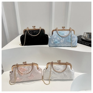 Lace evening bags in four colors with butterfly detail, metal handle and chain straps