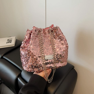Pink sequin bucket bag with silver chain strap and sparkling finish for party fashion