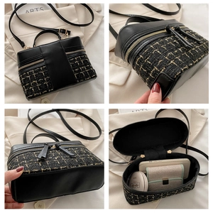 Macro view of black tweed handbag showing PU leather拼接, gold metal zippers and structure