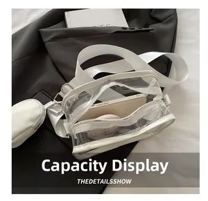Capacity display of clear PVC crossbody bag showing internal space for phone and makeup