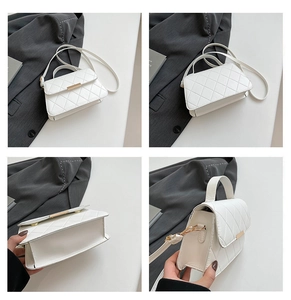 Détails d'un sac bandoulière matelassé blanc avec fermoir en métal doré et chaîne