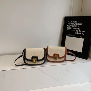 Retro contrast saddle bag in beige canvas and leather with gold hardware detail