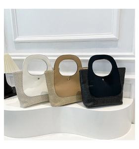 Detailed trio of vintage contrast-stitch straw tote bags in white, beige, and black