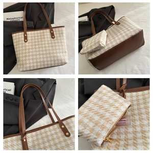 Detail view of large houndstooth tote bag and matching pouch with premium brown trim