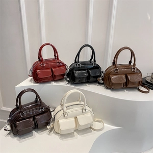 Vintage Boston tote bags in five colors with polished faux leather finish and twin pockets