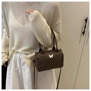 Retro shoulder bag with floral print, brown faux leather and white butterfly detail