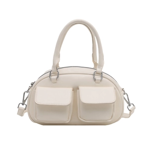 Chic cream white crossbody handbag with dual front pockets and silver hardware detailing