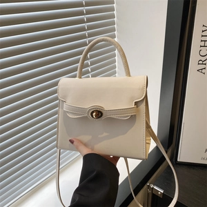 Minimalist cream white PU leather crossbody bag with golden twist lock and top handle