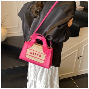 Detail of rose pink crossbody bag featuring woven texture and BEPRO letter embroidery