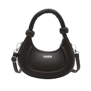 Minimalist dark brown half-moon crossbody bag with top handle and fashion print