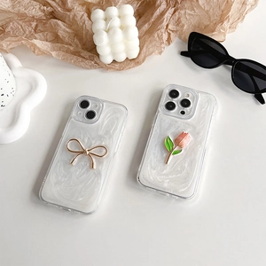 Detail of tulip and gold bow phone case with pearlescent finish and TPU protection