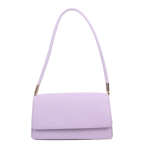 Minimalist light purple baguette shoulder bag with gold hardware and flap closure