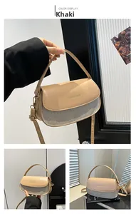 Detailansicht der khakifarbenen Satteltasche mit Glitzer-Patchwork und goldener Hardware