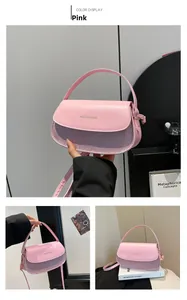 Detail der rosa und lila glitzernden Satteltasche mit goldenem Logo und feinen Nähten