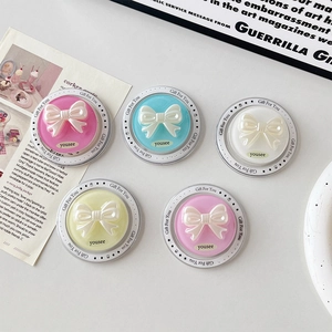 Set of 5 colorful 3D bow magnetic phone grips in pink, blue, white, yellow, and purple