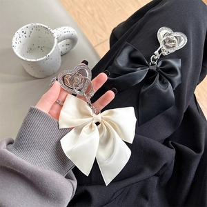 Bow heart foldable phone ring holder with rhinestones in black and cream satin finish