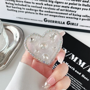 Sparkling heart-shaped rhinestone phone socket grip with crystals and pearly finish