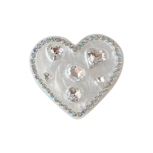 Sparkling rhinestone heart-shaped phone grip stand with white glitter finish and crystals