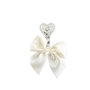 Rhinestone heart phone ring holder with a large white satin bow and foldable metal stand