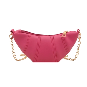 Rose pink croissant crossbody bag with vertical stitching and gold chain strap